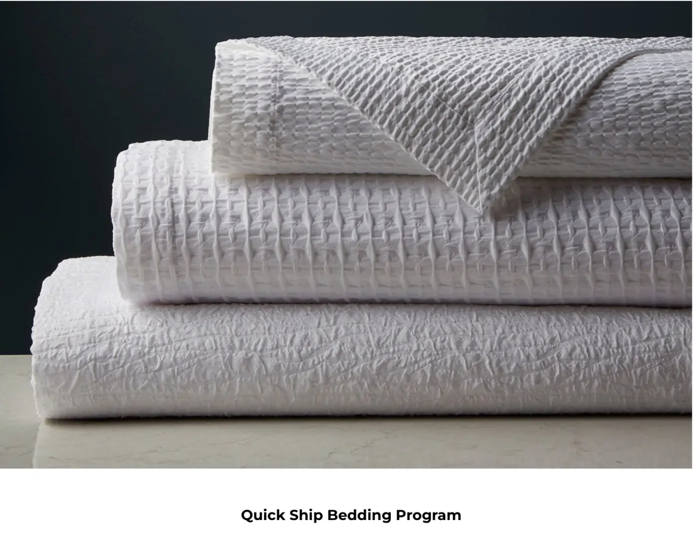 A Bunch of White Folded Towels